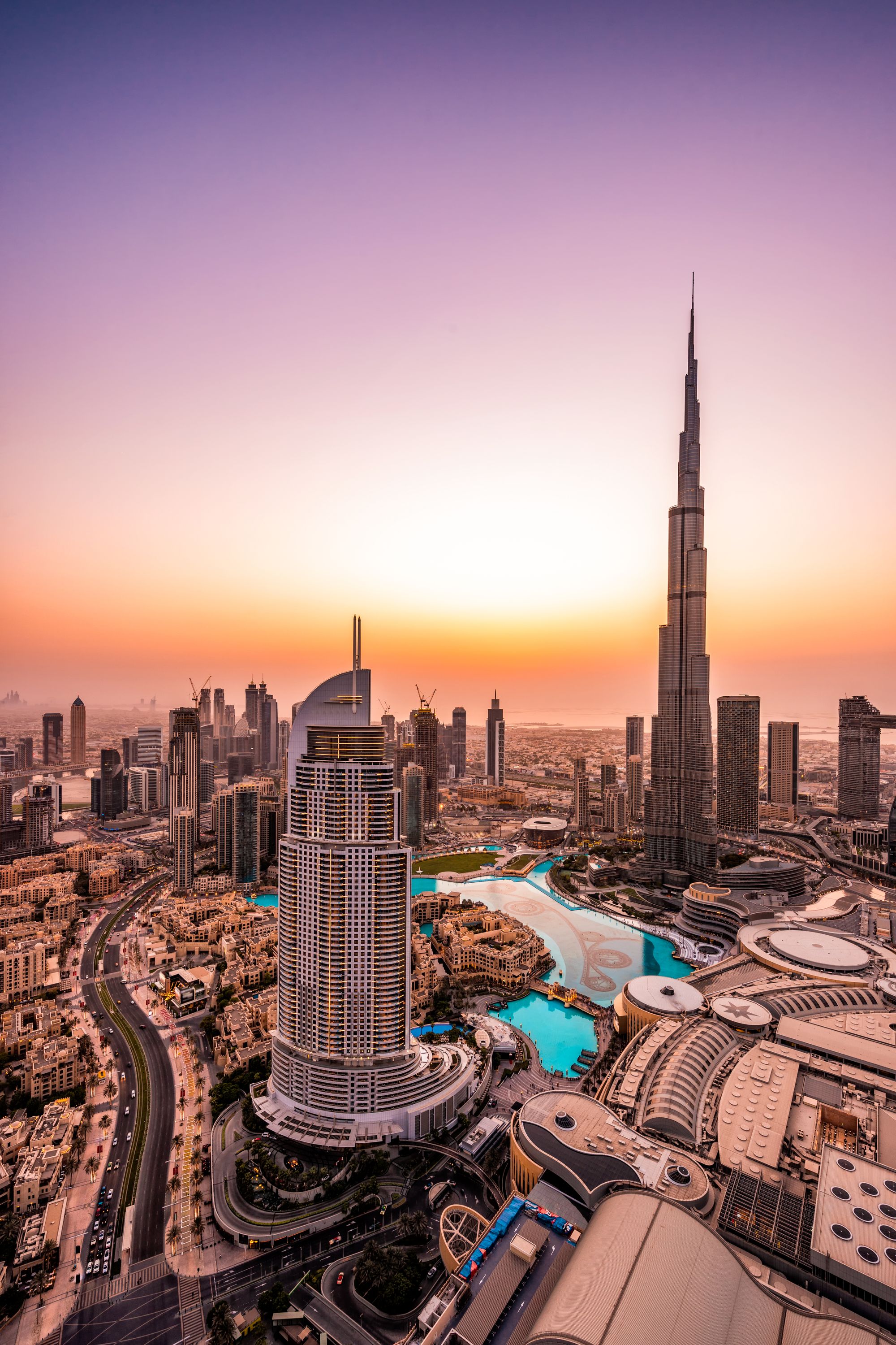 Downtown Dubai at sunset with the Burj Khalifa on the background